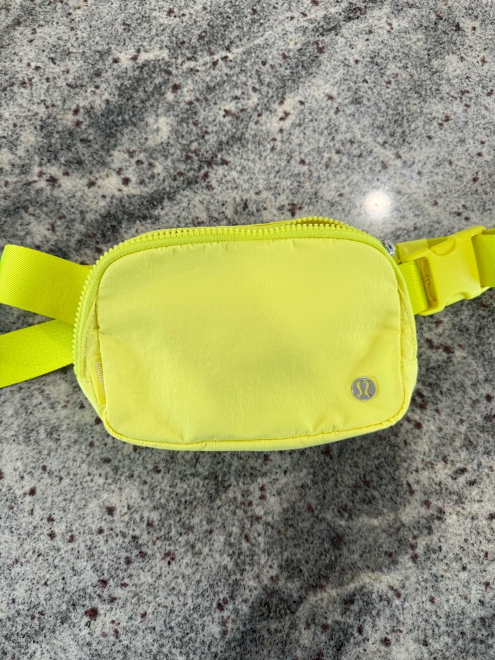 lululemon bright yellow fanny pack interior with mesh pocket